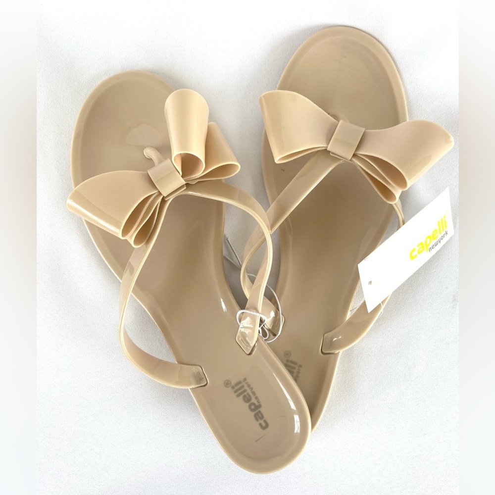 Capelli New York Women’s Nude Jelly Flip Flop Sandals With Double Bows, Size 9